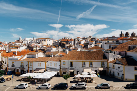 Cityscape of Evora with typical houses painted in white and ceramic tiled roofsのeditorial素材