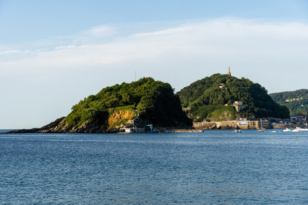 San Sebastian, Spain - July 7th, 2023: View of Santa Clara Island and Monte Urgull in the Bay of La Conchaのeditorial素材