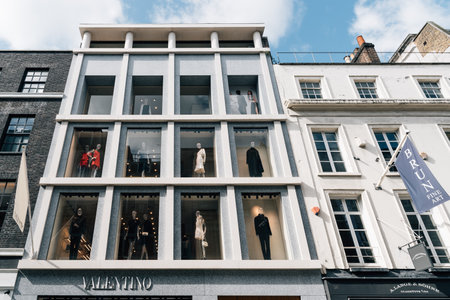 London, UK - August 27, 2023: Valentino fashion store in luxurious Bond Street in the West End. It is one of the most expensive and sought after areas of real estate in Europe, with prestigious and expensive shops established along the streetのeditorial素材