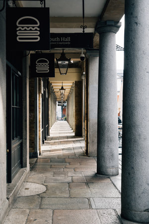 LONDON, UK - August 25, 2023: Colonnade of Covent Garden Market. Located in the West End of London, Covent Garden is renowned for its luxury fashion and beauty storesのeditorial素材