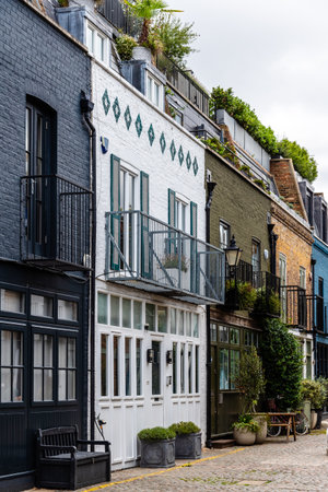 London, UK - August 26, 2023: View of St Lukes Mews a beautiful and cozy cobbled street in Notting Hill neighborhood near Portobello Roadのeditorial素材