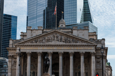 London, UK - August 25, 2023: Exterior view of the Royal Exchange, a historical commercial building. Detail of pediment and porticoのeditorial素材