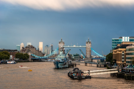 London, UK - August 26, 2023: Cityscape of London by Thames River at sunset