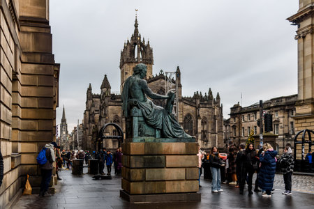 Edinburgh, UK - December 3, 2023: Statue of David Hume in the Royal Mile during Christmas timeのeditorial素材