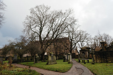Edinburgh, UK - December 5, 2023: Greyfriars Kirkyard is the graveyard surrounding Greyfriars Kirk...