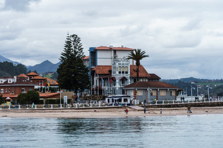 Ribadesella, Spain - March 27, 2024: Panoramic of Ribadesella. View of the tourist town and beach of Ribadesella in Asturiasのeditorial素材
