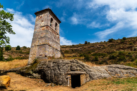 Belfry of the Rock church of Santo Justo and Pastor in Olleros de Pisuerga, Palencia, , Spain. Exterior Viewの写真素材