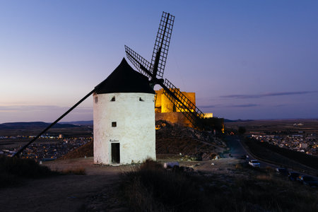 Windmills in Consuegra, Toledo. An icon of La Mancha. The windmills crown a hill over the town and known worldwide thanks to Don Quixote. Night viewの写真素材