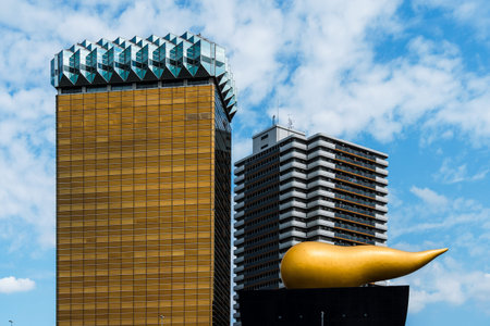 Tokyo, Japan - August 6, 2024: The iconic Asahi Beer Hall, designed by Philippe Starck, features a...