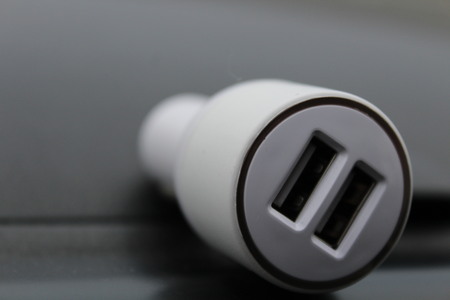 Usb splitter to the cigarette lighter in the carの写真素材