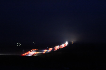 Refraction of light when photographing cars on the highway at night.の写真素材