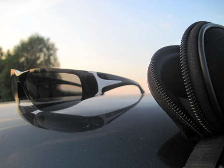 Sunglasses on a background of summer nature. Unique imageの写真素材