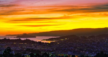 Sunset over the city of Pontevedra, Poio, Ria de Pontevedra and Tambo Island.