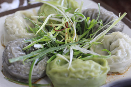 Chinese steamed dumplings on plate, closeup of photoの写真素材