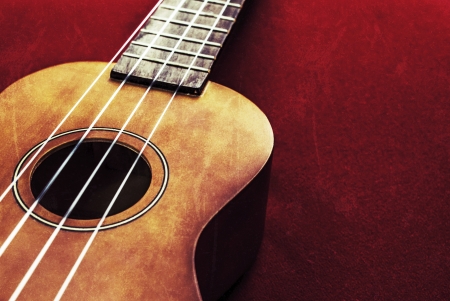 grunge image of ukulele on a vintage backgroundの写真素材