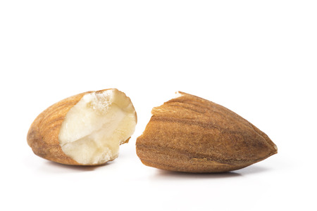 Cracked in half almondの写真素材