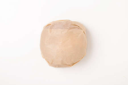Packed burger on white background, top view. Wrapped hamburger sandwich, blank mock up