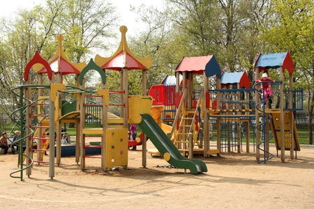 Colorful playground with playing children, Moscow, Russia - May 4, 2011のeditorial素材