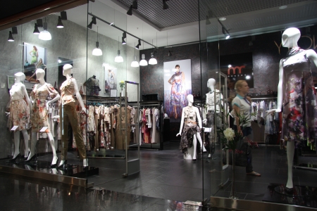 Fashion clothes shop window in a big mall, Moscow, Russia - 10.10.2011のeditorial素材