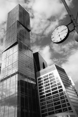 Time for Business - Black and white concept with modern skyscrapers and watchの写真素材