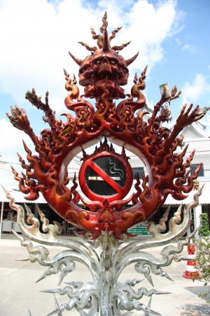 No smoking sign statue in White Temple in Chiang Rai, Thailandのeditorial素材