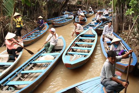 Vietnam people at the boats in Mekong Delta - 31.07.2014のeditorial素材