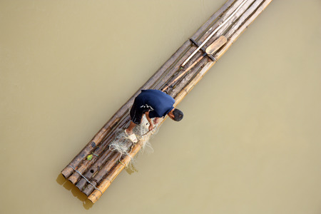 An unidentified fisherman with a net in Vietnamの写真素材