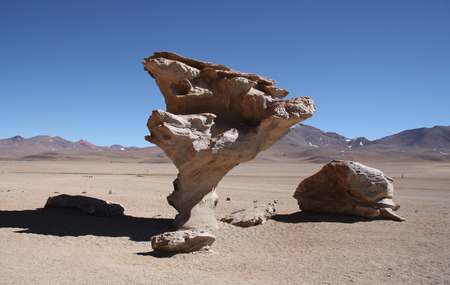 Stone valley with famous Arbol de Piedra, a stone rock formation by wind erosion, in Atacama Desert in Boliviaの写真素材