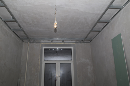 Concrete walls, frames and plaster boards during the renovation of an apartmentの写真素材