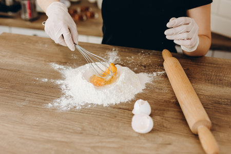Flour and egg. Preparation for making dough. Cooking concept.の写真素材