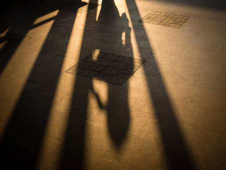 woman shadow on ground