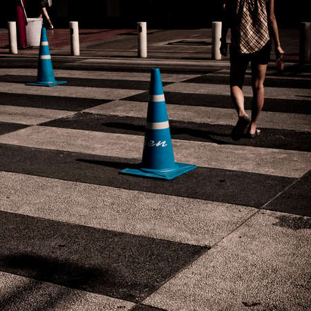 man crossing streetの写真素材