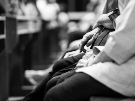 old lady hand in churchの写真素材