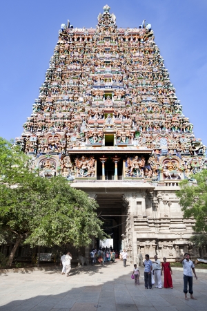 Madurai, India-September 11, 201: Many parishioners and pilgrims visit every year the Sri Meenakshi Hindu Temple where they pray and contemplate the architectural beautyのeditorial素材