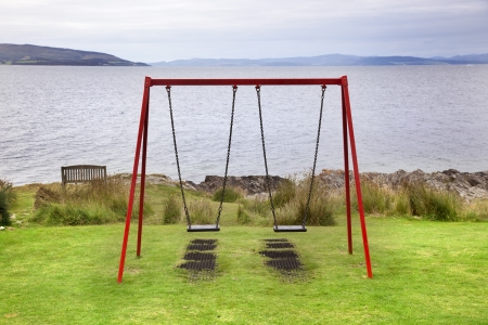 swing on seaside play equipment in Arran Island  Scotland の写真素材