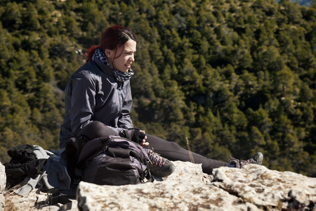 Valderrobres, Spain. Frebruary 9, 2017: Mountaineer on the top of Peak of La caixa resting for the climbのeditorial素材