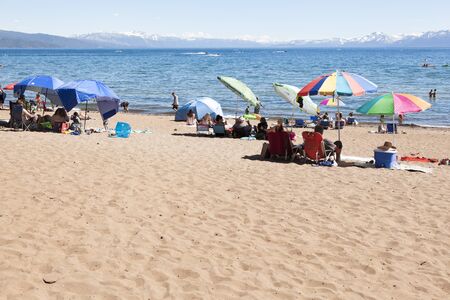 South Lake Tahoe, USA-June 18, 2017: Sunbathing on Lake Tahoe. Californiaの写真素材