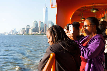 New York, USA-June 8, 2017: Many tourists take the ferry from New York to New Jersey to take...
