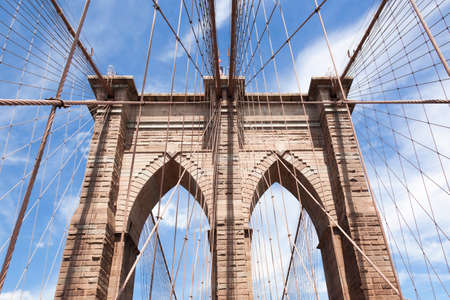 Brooklyn bridge with de American flag on the top