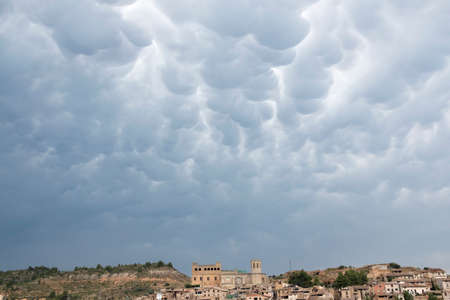 Valderrobres, Spain. August 14, 2020: Clouds over View the medieval Village in Teruel province with Calatravo Castleのeditorial素材