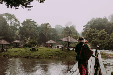 Luang Prabang-Laos: July 28, 2007: Waterfalls in Mekong Valley where there is a recreation area and people can go fishingのeditorial素材