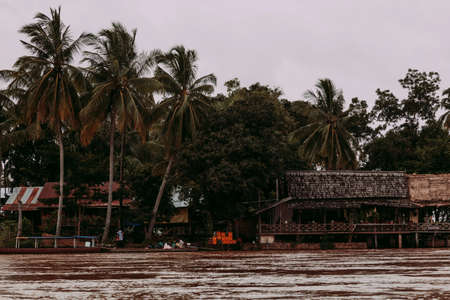 Si Phan Don, Laos-August 1, 2009: One of the most typical means of transport in Laos is by canoeing down the Mekong Riverのeditorial素材