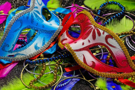 Red And Blue Carnival Masks With Feathers And Jewelryの写真素材