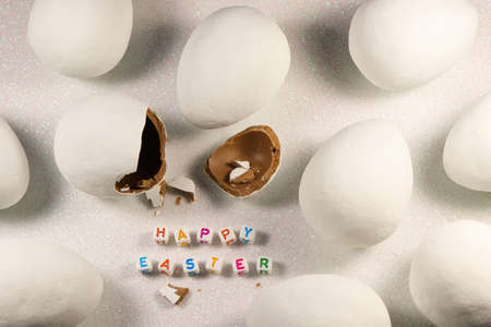 Happy Easter Chocolate Candy Eggs On Snowy White