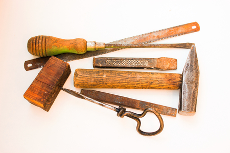 Old rusty tools must be replaced with new ones.の写真素材