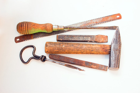 Old rusty tools must be replaced with new ones.の写真素材