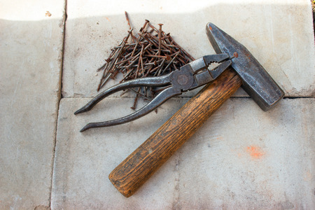 Old rusty tools must be replaced with new ones.の写真素材