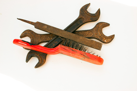 Old rusty tools must be replaced with new ones.の写真素材