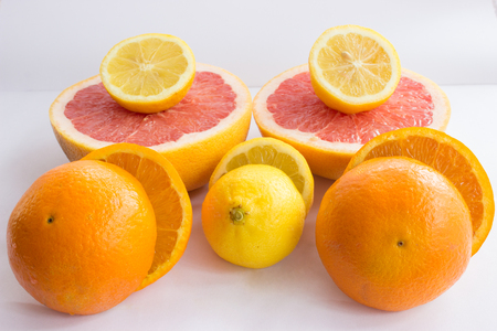 Citrus fruits composed of grapefruit, lemons and oranges.の写真素材