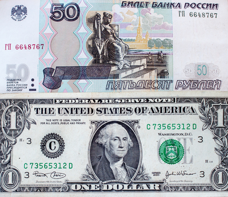 Banknote - fifty russian rubles and one US dollarの写真素材